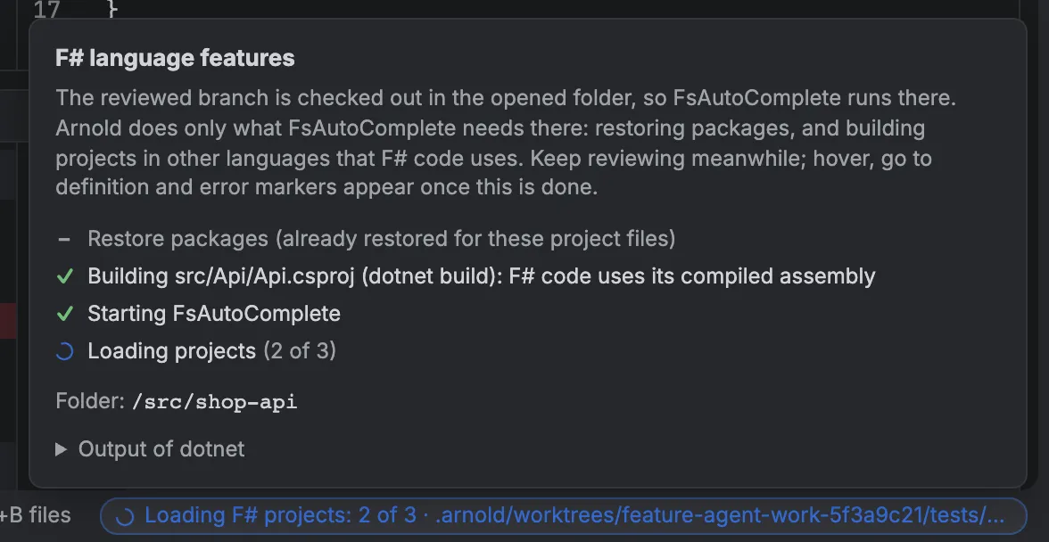 The F# language features popup: restoring, building, starting FsAutoComplete and loading projects